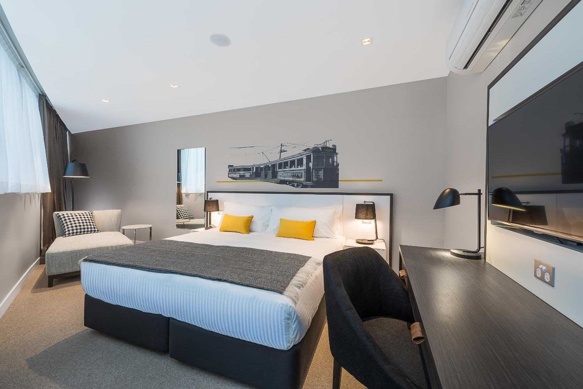 Hotel Peppers Docklands Melbourne City Exterior foto A bedroom at the hotel